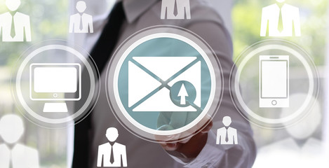 Businesswoman presses sending a message on a virtual screen. 