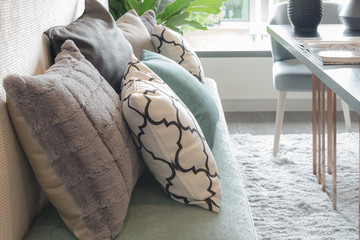 Fototapeta na wymiar set of pillows on luxuty sofa in living room