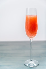 Glass of bellini cocktail