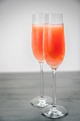 Two glasses of bellini cocktail