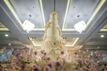White wedding cake with flower