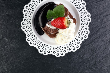 Chocolate yule log christmas cake. Valentine day cake with straw