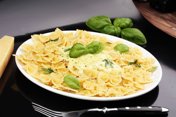 Delicious creamy Italian penne pasta starter with pepper seasoni