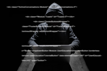 hacker at work with graphic user interface around