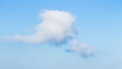 White clouds on blue sky background