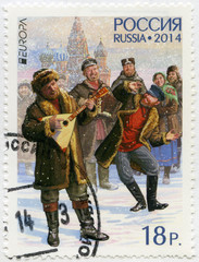 RUSSIA - 2014: shows men with balalaika and bayan