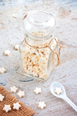 Glass jar with candies selective focus