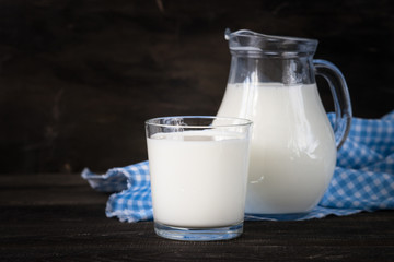 Dairy products. Milk in glass and in jug