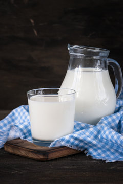 Dairy products. Milk in glass and in jug