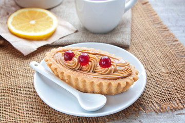 cake on a white plate selective focus