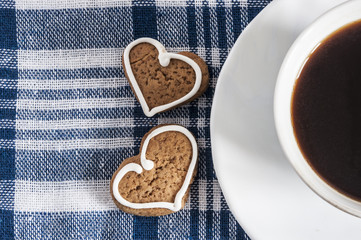 Coffee and a heart shaped cookie