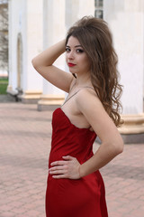 Beautiful caucasian girl in red dress