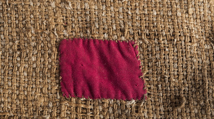 Burlap with red patch