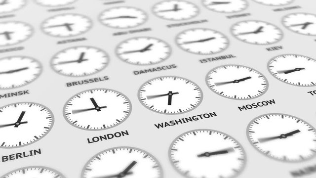Round clocks are going and showing different time for different cities around the world, in motion. Time in capitals in different time zones. Geopolitics concept. Black-and-white video