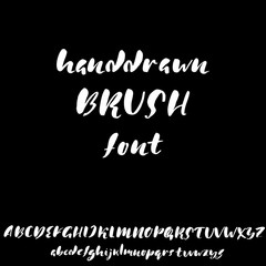 Hand drawn font made by dry brush strokes. Grunge style alphabet