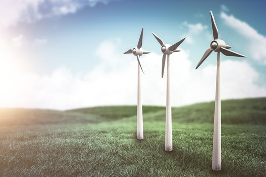 Composite image of wind turbines against white screen 3d