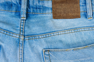 Jeans background of blue denim textile