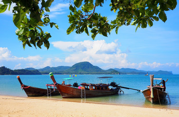 Naklejka na ściany i meble tropical beach with long boats in thailand