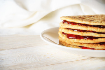 pancakes with jam on a plate