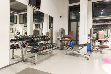 Fototapeta na wymiar Interior of gym for bodybuilding