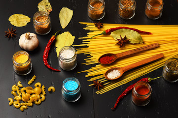 cooking pasta with spice, chili pepper, garlic and badian