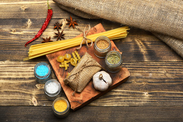 cooking pasta with spice, chili pepper, garlic and badian