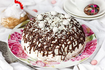 Easter cake with chocolate and candy eggs