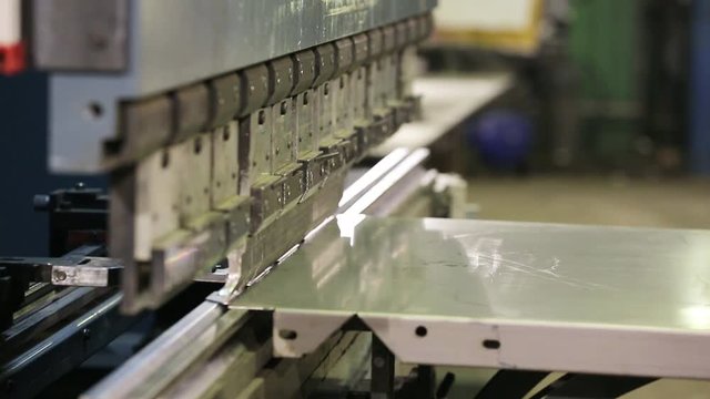 Bending Special Device The Metal Sheet. Metal Combustion Process. Factory