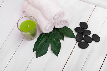 Beautiful composition of spa treatment on white wooden table