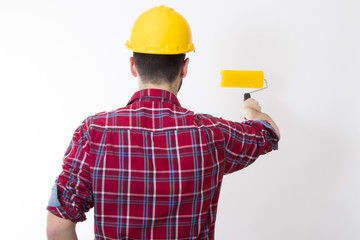 man working painting the wall