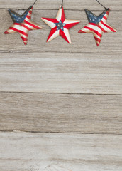 USA patriotic old flag on a stars and weathered wood background