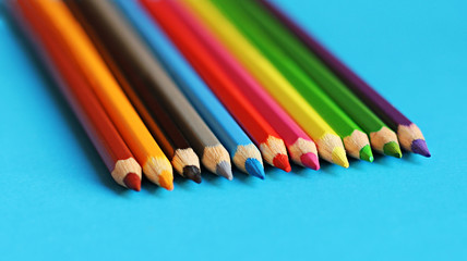 coloured pencil pastels on a colour background isolated