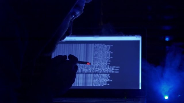 Hoodie Hacker in the dark- close up