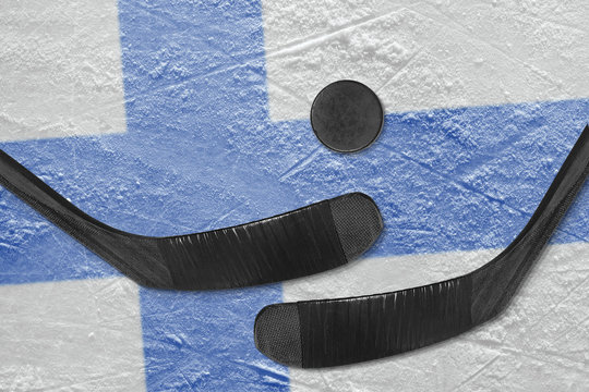 Finnish flag and two hockey sticks hockey