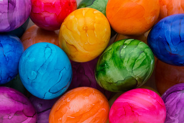 Fototapeta na wymiar Easter eggs painted in colors on a white background.
