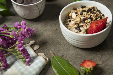 Granola served with yogurt, fruits and honey