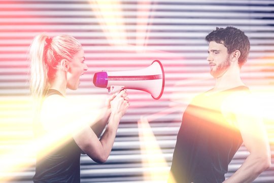 Trainer yelling through megaphone