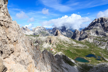 Fototapeta na wymiar Sexten Dolomites panorama with mountain Toblinger Knoten and alpine hut Dreizinnenhütte in South Tyrol, Italy