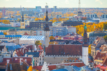 Fototapeta na wymiar Towers of Old Town of Tallinn: City Hall, Jaani church, Puhavaimu church. Aerial view.