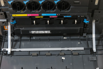 CMYK toner cartridges in laser copier machine