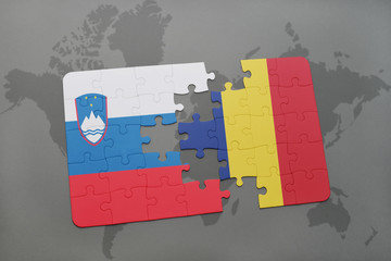 puzzle with the national flag of slovenia and chad on a world map