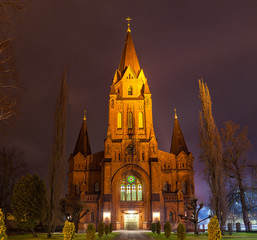 Fototapeta na wymiar St. Peter church in Tartu, Estonia. Old brick church at night.