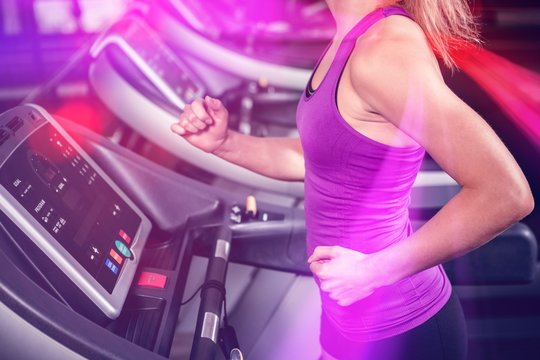 Woman Walking On Treadmill