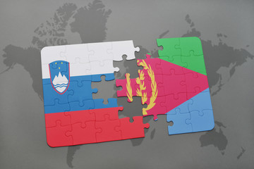puzzle with the national flag of slovenia and eritrea on a world map