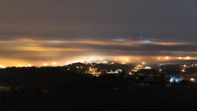 Fog Flows Like a River at Night Above Rapid City