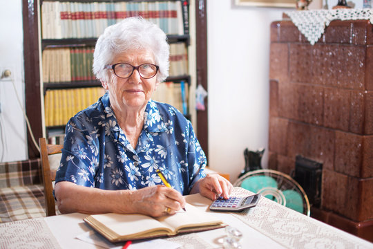 Senior Woman Doing Finances At Home.