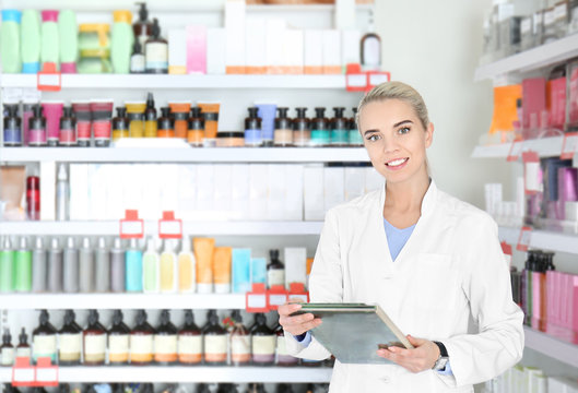 Female Shop Assistant At Work