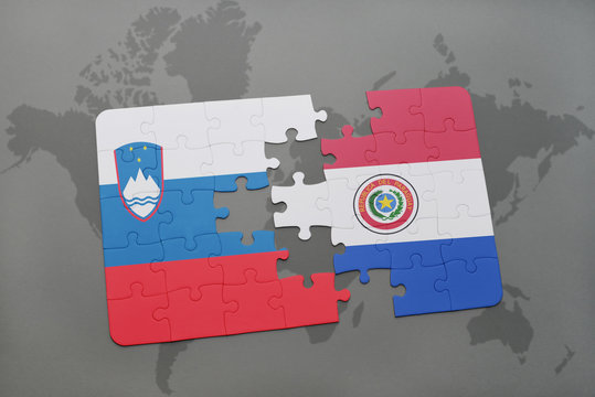 puzzle with the national flag of slovenia and paraguay on a world map