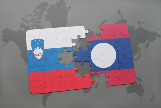 puzzle with the national flag of slovenia and laos on a world map