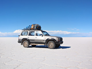 Fototapeta na wymiar 4wd expedition vehicle on the Salar
